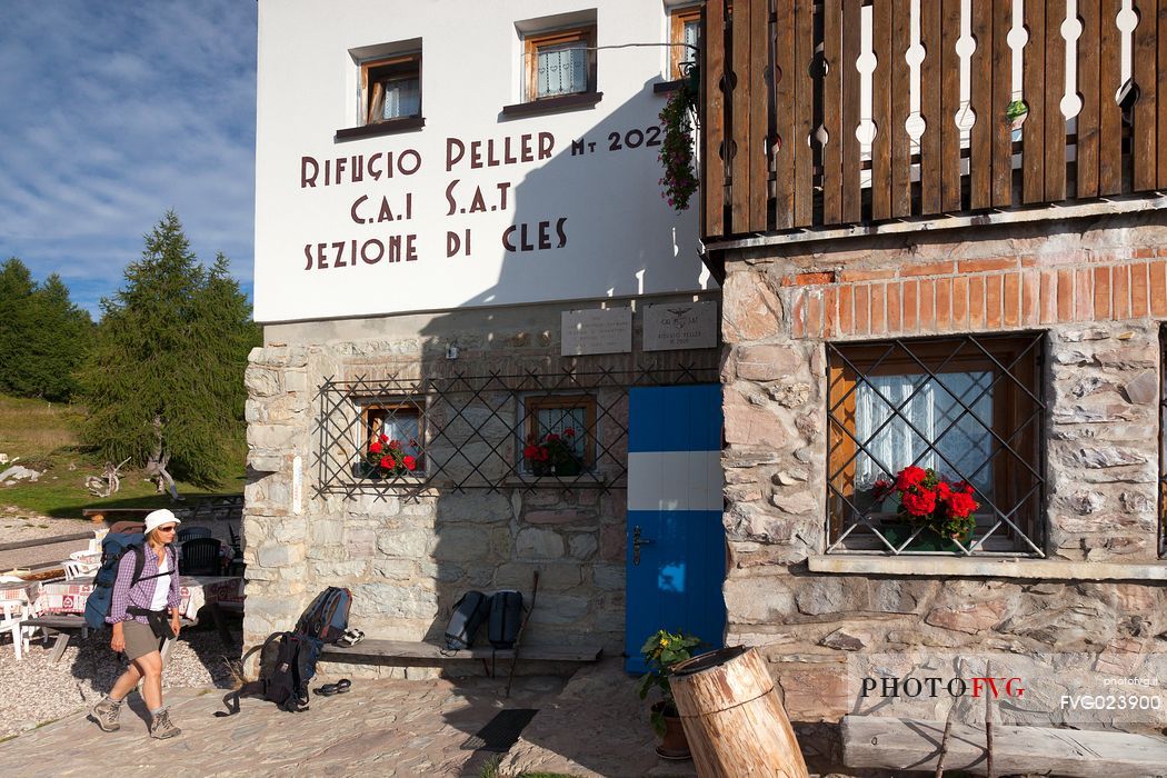 Hiker at Peller mountain hut, Brenta's dolomites, Trentino, Italy