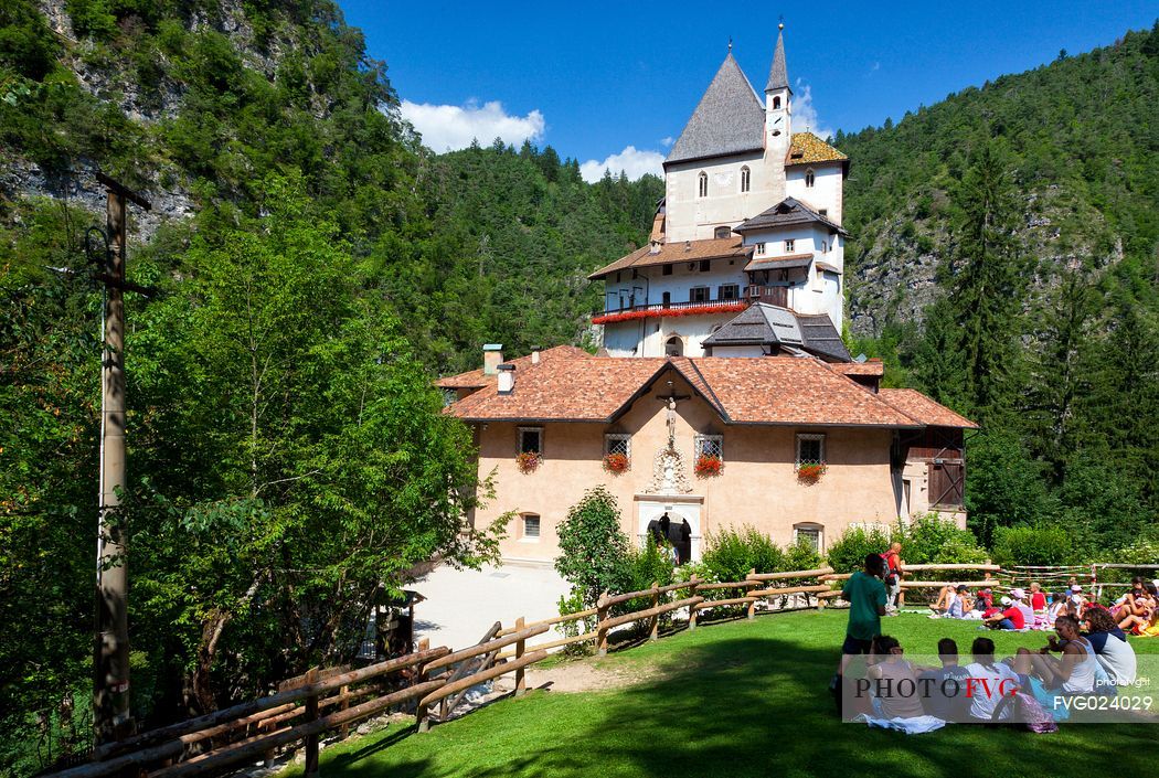 Tourists admire the San Romedio Sanctuary, Val di Non, Trentino, Italy