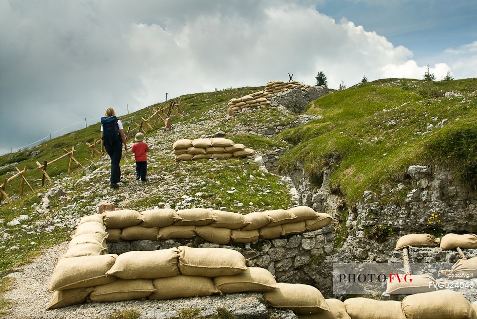 Walking among the trenches of the open-air museum of the Great War, Monte Zebio mountain, Asiago, Italy