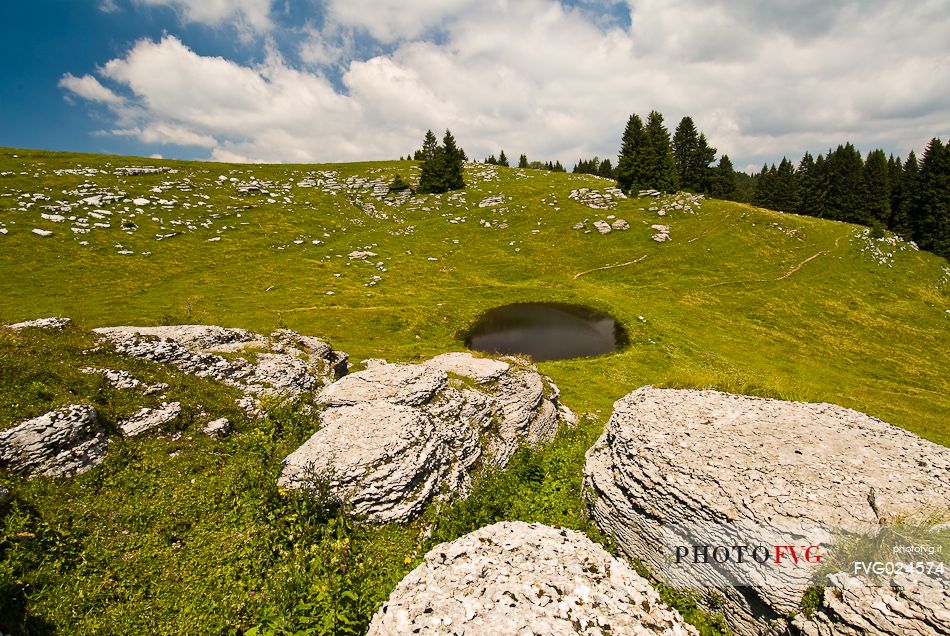 Little lake at Meletta di Gallio, Asiago, Italy