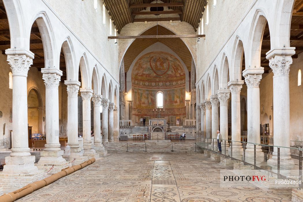 Floor mosaic and the magnificent frescoed ceiling of the Basilica of Aquileia, Italy