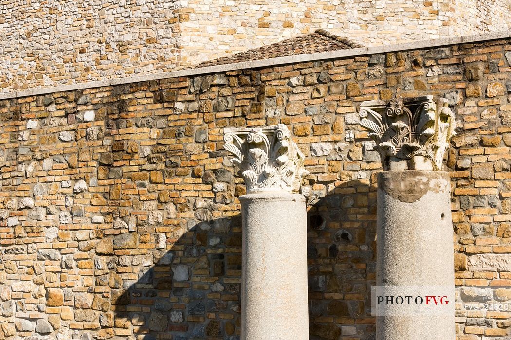 Detail of two capitals in the Roman Catholic church of Aquileia, Italy