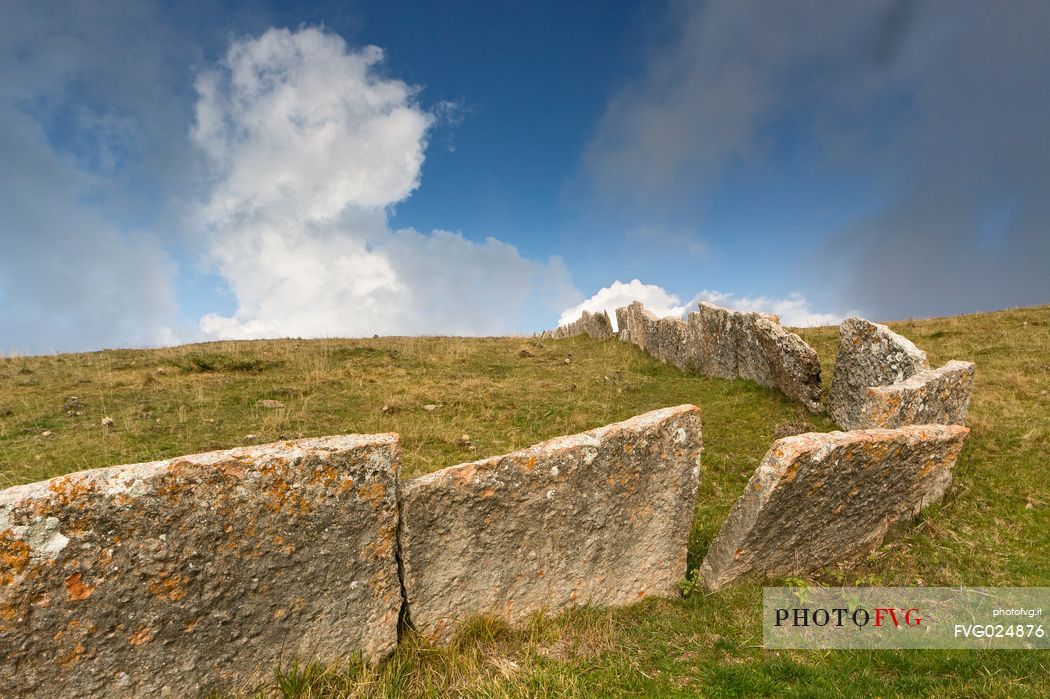 Ancient and typical dry stone wall in Lessinia, Prealps of Veneto, Verona, Italy