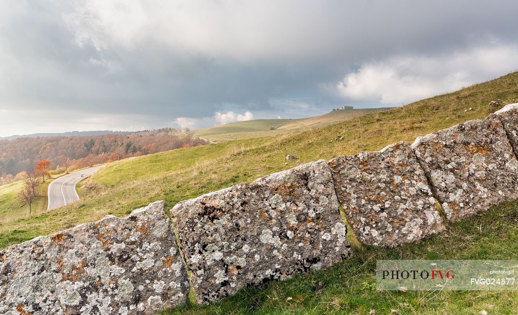 Ancient and typical dry stone wall in Lessinia, Prealps of Veneto, Verona, Italy