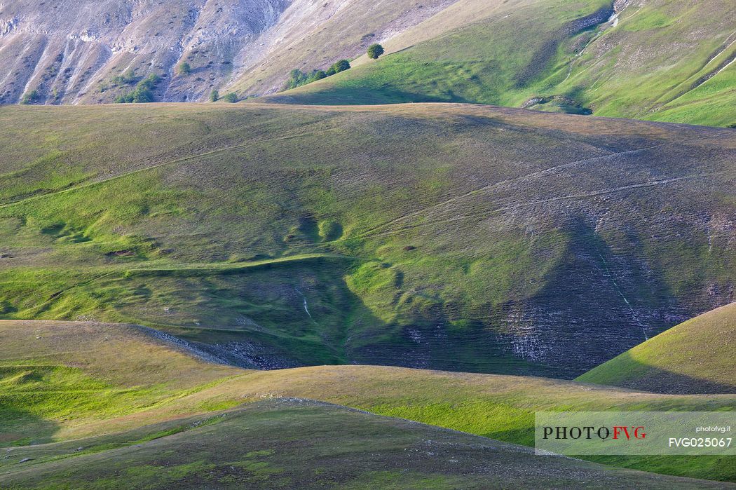 Rolling landscape of Monte Vettore in spring, Castelluccio di Norcia, Italy