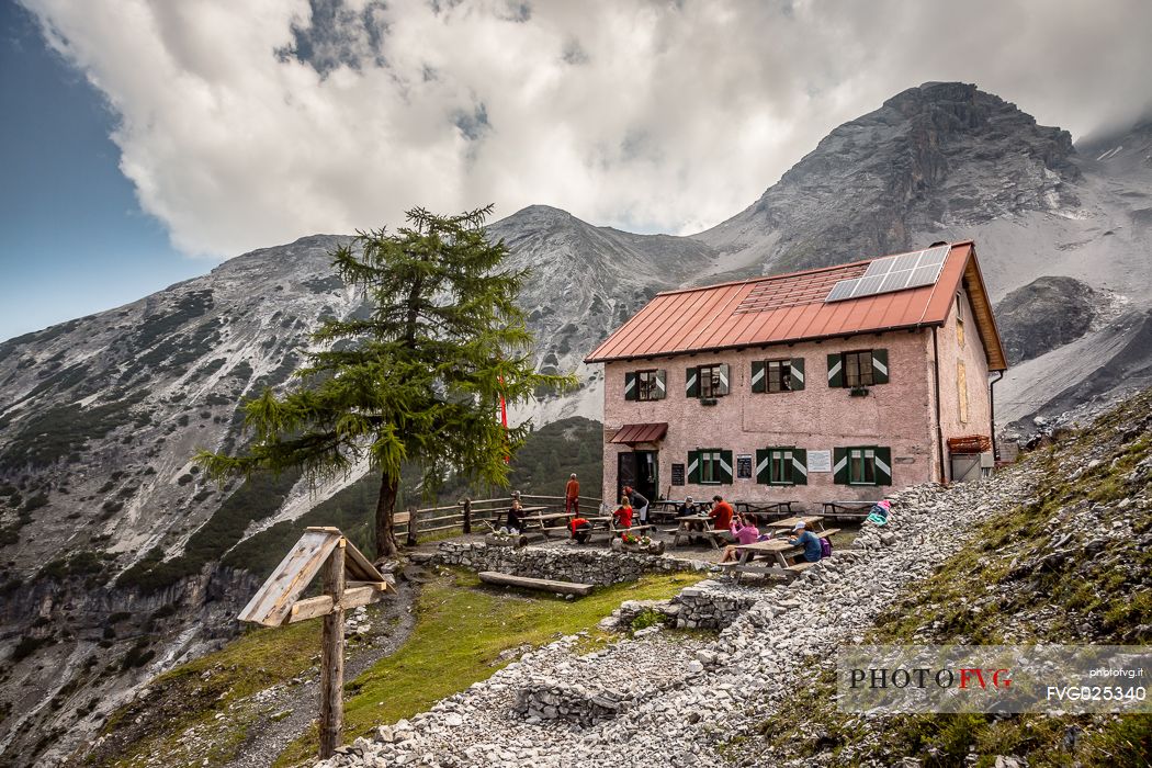 Hikers at Borletti hut in the Stelvio national park, Trafoi, South Tyrol, Italy