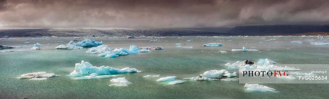 Blue iceberg on Jokulsarlon lagoon lake, Vatnajokull National Park, Iceland