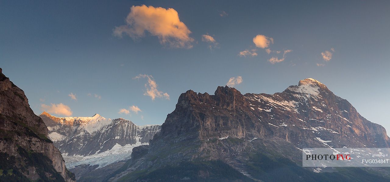 Sunset on Eiger and Fiescherhorn mountain in the Jungfrau mountain group from Grindelwald village, Berner Oberland, Switzerland, Europe