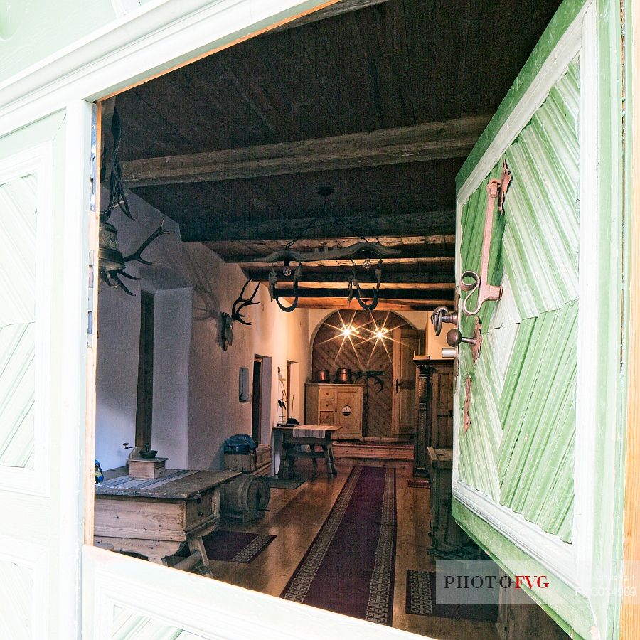 Detail of interior house in Guarda, a tipical village with houses ornated with old painted stone 17th Century buildings, Scuol, Engadine, Canton of Grisons, Switzerland, Europe