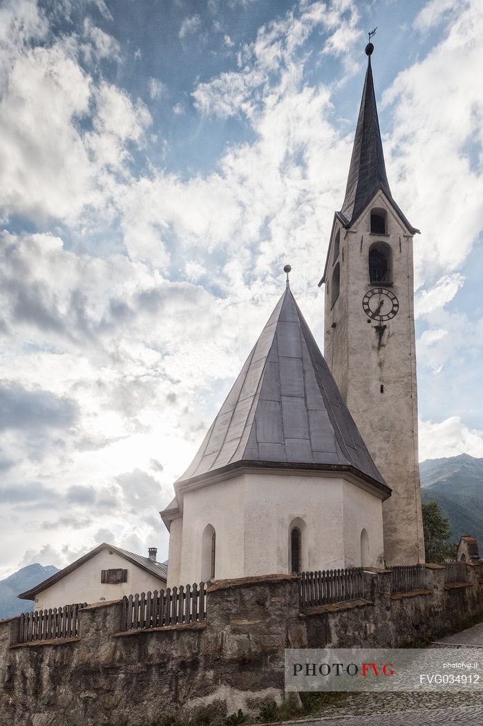 Old church in Guarda, a tipical village with houses ornated with old painted stone 17th Century buildings, Scuol, Engadine, Canton of Grisons, Switzerland, Europe