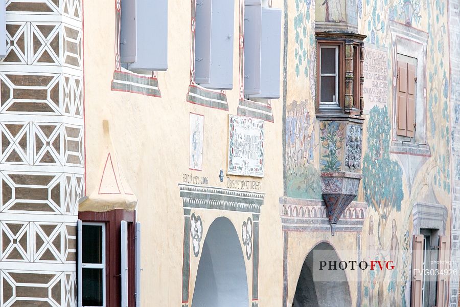 Detail of  old houses in Ardez. In the background Chasa Clalguna, historic house with frescos representing Adam and Eve, Low Engadin, Canton of Grisons, Switzerland, Europe