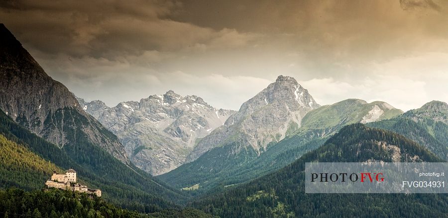 Tarasp Castle and the mountains of Swiss national park, Lower Engadin, Canton of Grisons, Switzerland, Europe