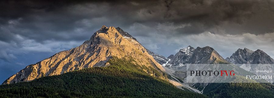 The mountains of national park swiss at sunset next to Scuol, low engadin, canton of Grisons, Switzerland, Europe