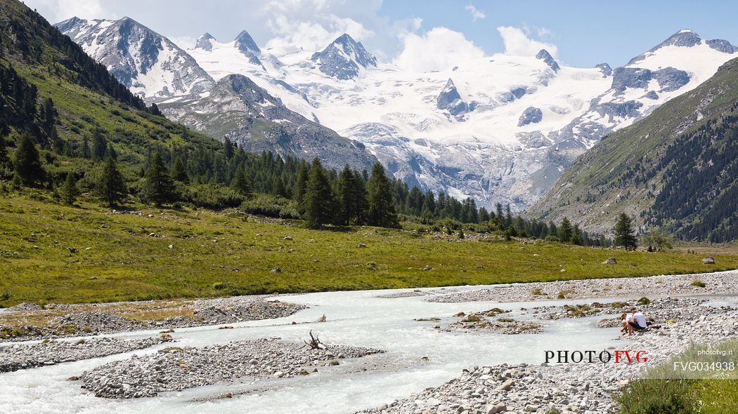 Relax in Roseg valley, in the background the glacier and the Piz Roseg in the Bernina mountain group, Pontresina, Engadine, Canton of Grisons, Switzerland, Europe