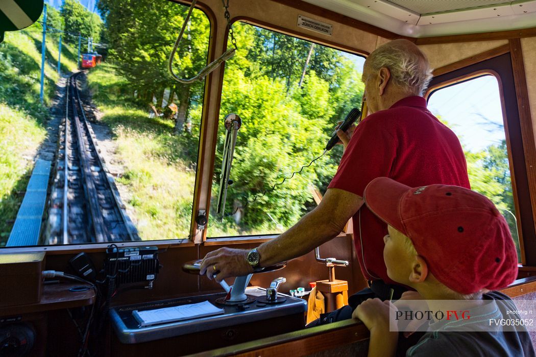 Inside the red Cogwheel Railway going up Pilatus Mountain, Border Area between the Cantons of Lucerne, Nidwalden and Obwalden, Switzerland, Europe