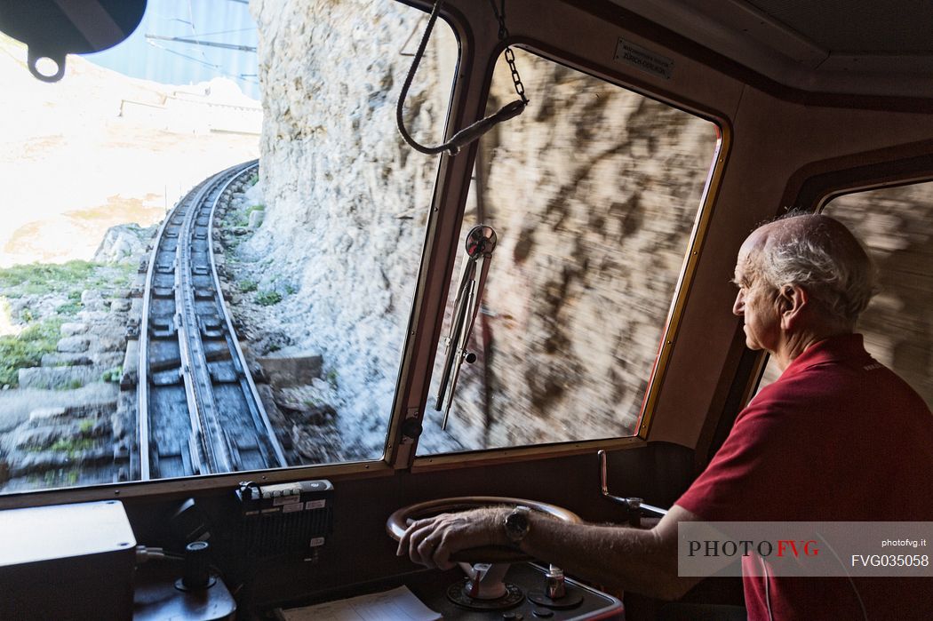 Inside the red Cogwheel Railway going up Pilatus Mountain, Border Area between the Cantons of Lucerne, Nidwalden and Obwalden, Switzerland, Europe