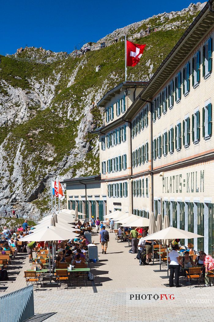 Tourists on the terrace of Pilatus Klum hotel on Pilatus mountain top, Lucerne, Border Area between the Cantons of Lucerne, Nidwalden and Obwalden, Switzerland, Europe