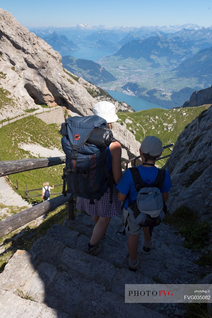 Hiking on the Pilatus mountainn area, in the background the Lucerne lake,  Border Area between the Cantons of Lucerne, Nidwalden and Obwalden, Switzerland, Europe