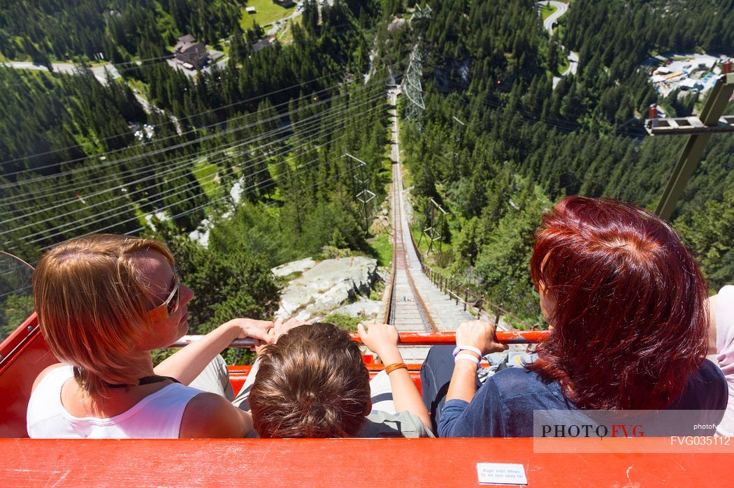 Tourists come down with the Gelmerbahn funicular, the steepest in the world, Canton of Bern, Switzerland, Europe
