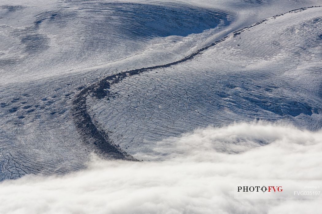 Detail of Gorner glacier in the fog from Gornergrat top, Monte Rosa or Breithorn mountain range, Zermatt, Valais, Switzerland, Europe
 