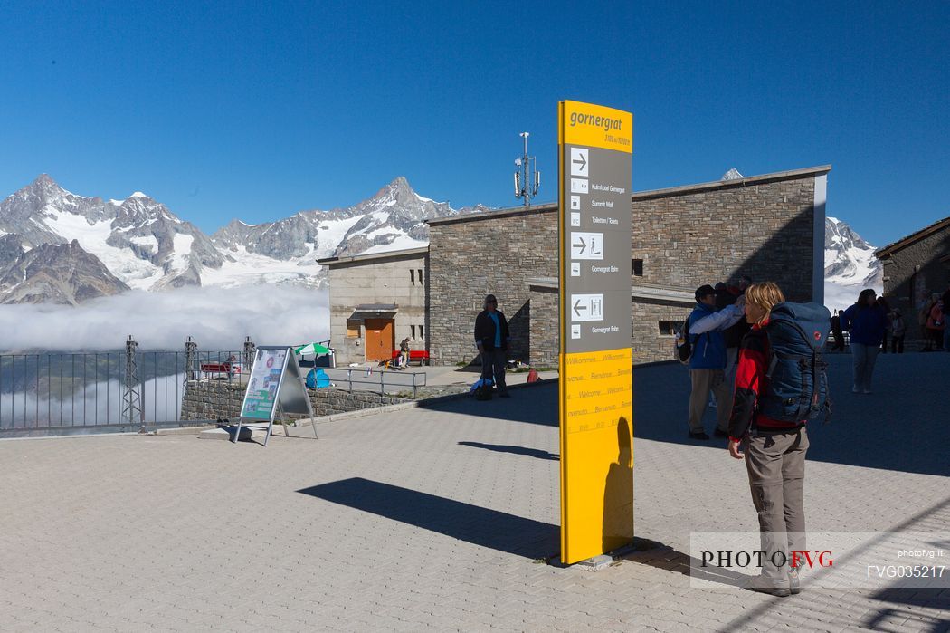 Tourist at the Gornergrat summit railway station, Zermatt, Valais, Switzerland, Europe