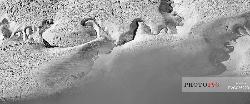 Detail of stream in the Gorner glacier from Gornergrat mountain top, Monte Rosa or Breithorn mountain range, Zermatt, Valais, Switzerland, Europe
 