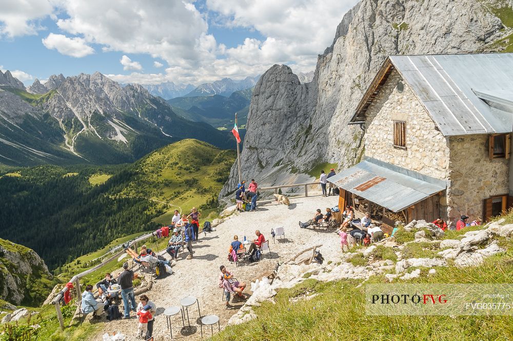 Hikers at Calvi mountain hut in Sesis valley, Sappada, dolomites, Friuli Venezia Giulia, Italy, Europe