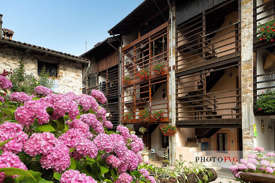 Traditional house with the dalz, the typical wooden balcony in the small village of Andreis, Friuli Venezia Giulia, dolomites, Italy, Europe