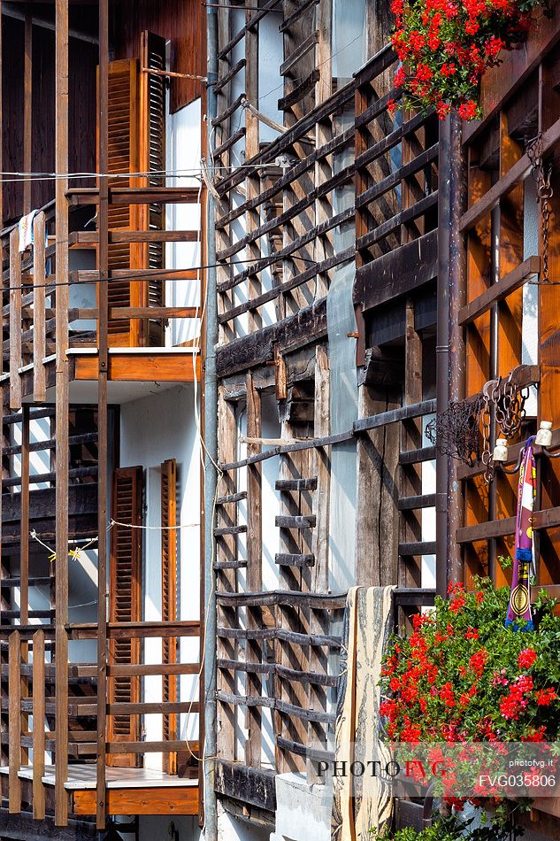 Detail of traditional house with the dalz, the typical wooden balcony in the small village of Andreis, Friuli Venezia Giulia, dolomites, Italy, Europe