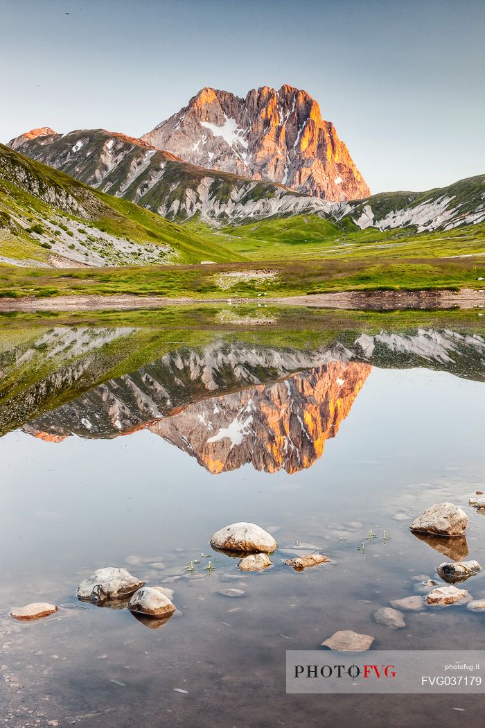 The Corno Grande peak reflected on Pietranzoni lake, Campo Imperatore, Gran Sasso and Monti della Laga national park, Abruzzo, Italy, Europe