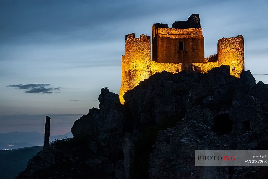 Rocca Calascio castle and the small villages in the valley at twilight, Gran Sasso national park, Abruzzo, Italy, Europe
