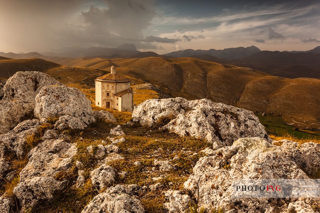 Madonna della Piet church near Rocca Calascio with Gran Sasso mountain range in the background, Gran Sasso national park, Abruzzo, Italy, Europe