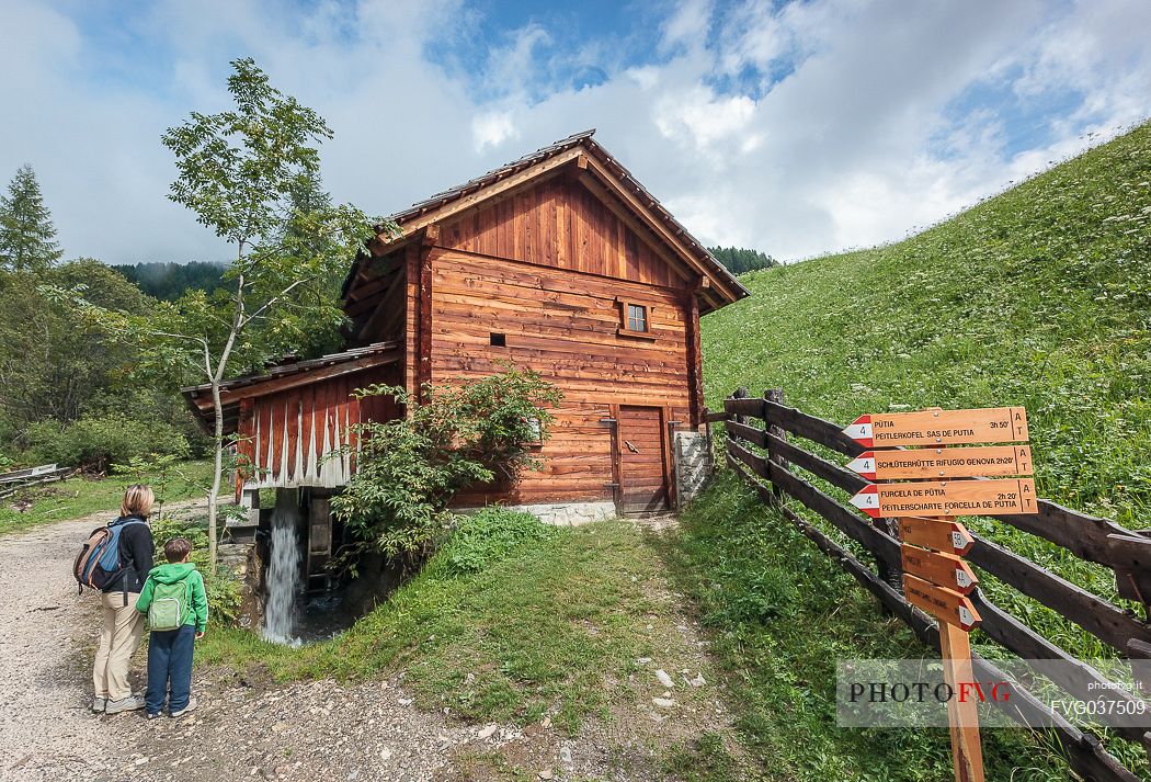 Mother and child visit the valle dei Mulini valley, Longiar, Badia valley, dolomites, South Tyrol, Italy, Europe