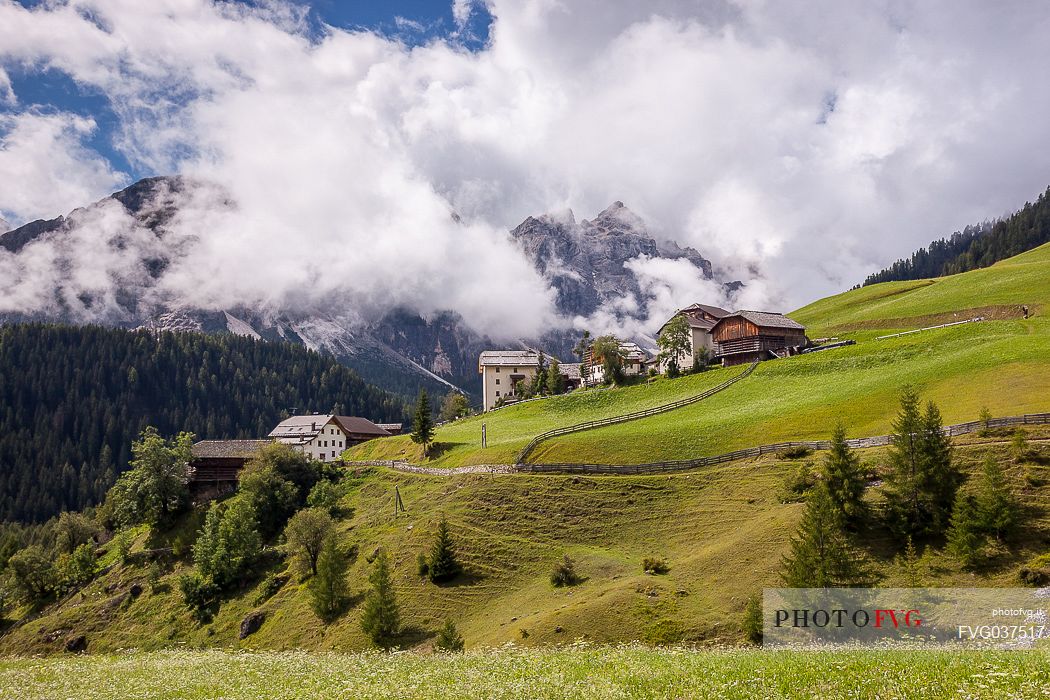 Ladin Mountain Village of Misci in the valley of Mills against Puez group of mountains, Longiar, Badia valley, Trentino Alto Adige, Italy, Europe