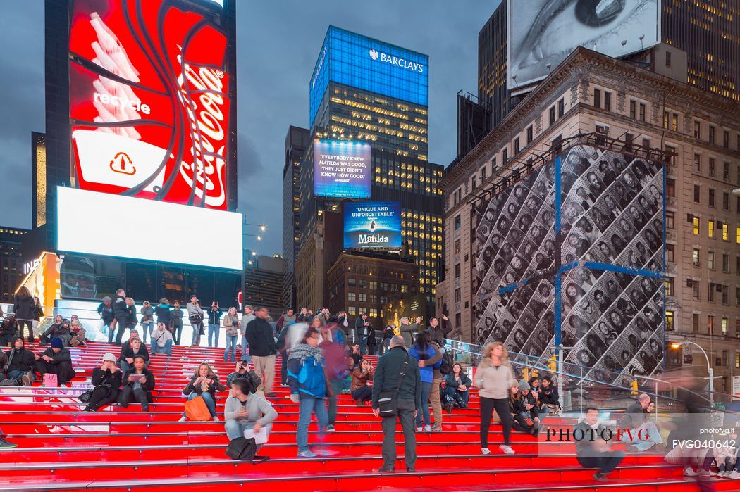 People at the Duffy Square, Red Stairs, of Times Square, at twilight, Manhattan, New York, United States