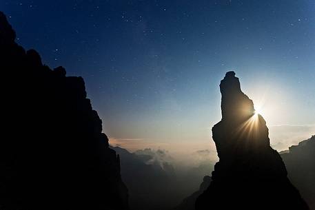 Campanile di Val Montanaia at night with stars in the sky