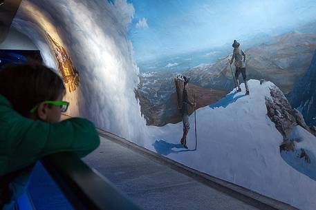 Chilld inside at the Jungfraujoch station, the highest railway station in the Alps, Aletsch glacier, Bernese alps, Switzerland Chilld inside at the Jungfraujoch station, the highest railway station in the Alps, Aletsch glacier, Bernese alps, Switzerland