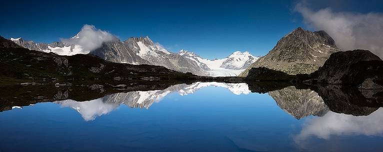 Aletsch glacier reflected on the Tallisee or Talli lake, Eggishorn, Fiesch, Valais, Switzerland, Europe