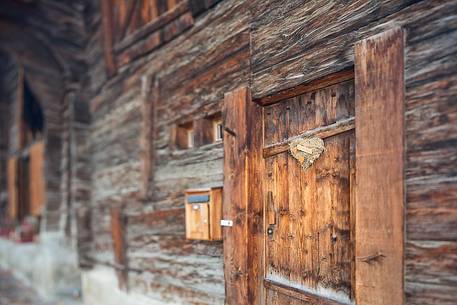 Detail of traditional alpine house in Mnster Geschinen village, Fiesh, Canton of Valais, Switzerland, Europe
