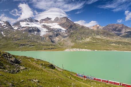 Rhaetian railway, Route from St. Moritz - Tirano, UNESCO World Heritage Site, at Bernina pass with Lago Bianco Lake, Engadin, Canton of Grisons, Switzerland, Europe