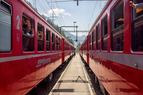 Bernina Express train, Rhetic railways, at the Cavaglia station, Canton of Grisons, Switzerland, Europe