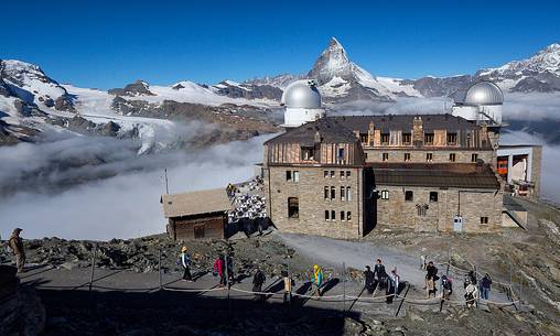 Kulm hotel and the astronomic observatory at the Gornergrat, in the background the Matterhorn or Cervino mount, Zermatt, Valais, Switzerland, Europe
