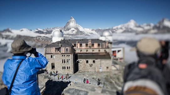 Tourists at the Gornergrat photographing the Matterhorn or Cervino mount, Zermatt, Valais, Switzerland, Europe
