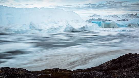 Moving ice in the water of Illulissat Fjord