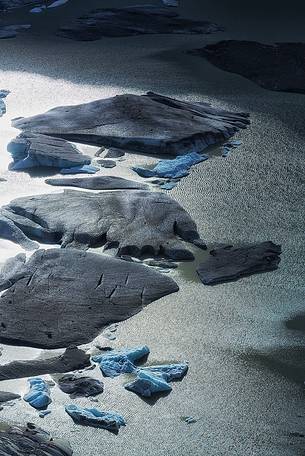 Iceberg on the little fusion lake on Rhone Glacier at Furka Pass, Canton of Valais, Switzerland, Europe