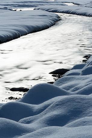 Sunrise in the alpine river Cellina