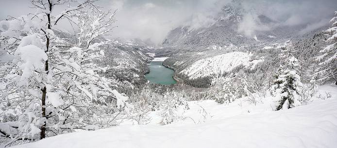 Heavy snowfall on fir-trees.
A magic landscape around the lake of Vajont in the Dolomiti Friulane Natural Park