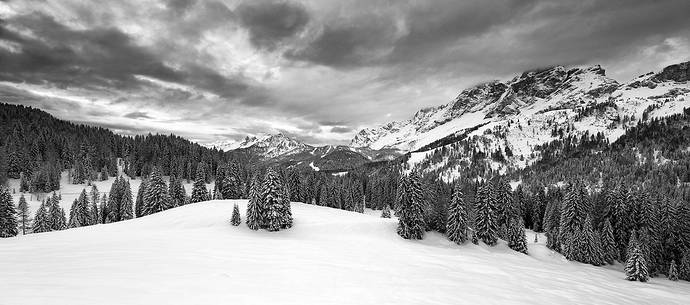 Zoldana Valley and Civetta Mountain group at dawn after a night snowfall