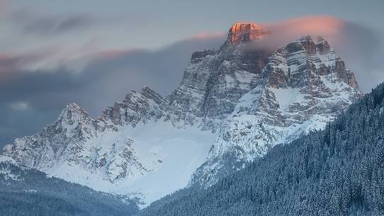 The Pelmo mountain at sunset after an intense snowfall The Pelmo mountain at sunset after an intense snowfall