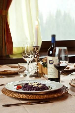 Orzotto with blueberries and alpine cheese, a typical plate of the restraunt Morgenleit in Sauris Orzotto with blueberries and alpine cheese, a typical plate of the restraunt Morgenleit in Sauris